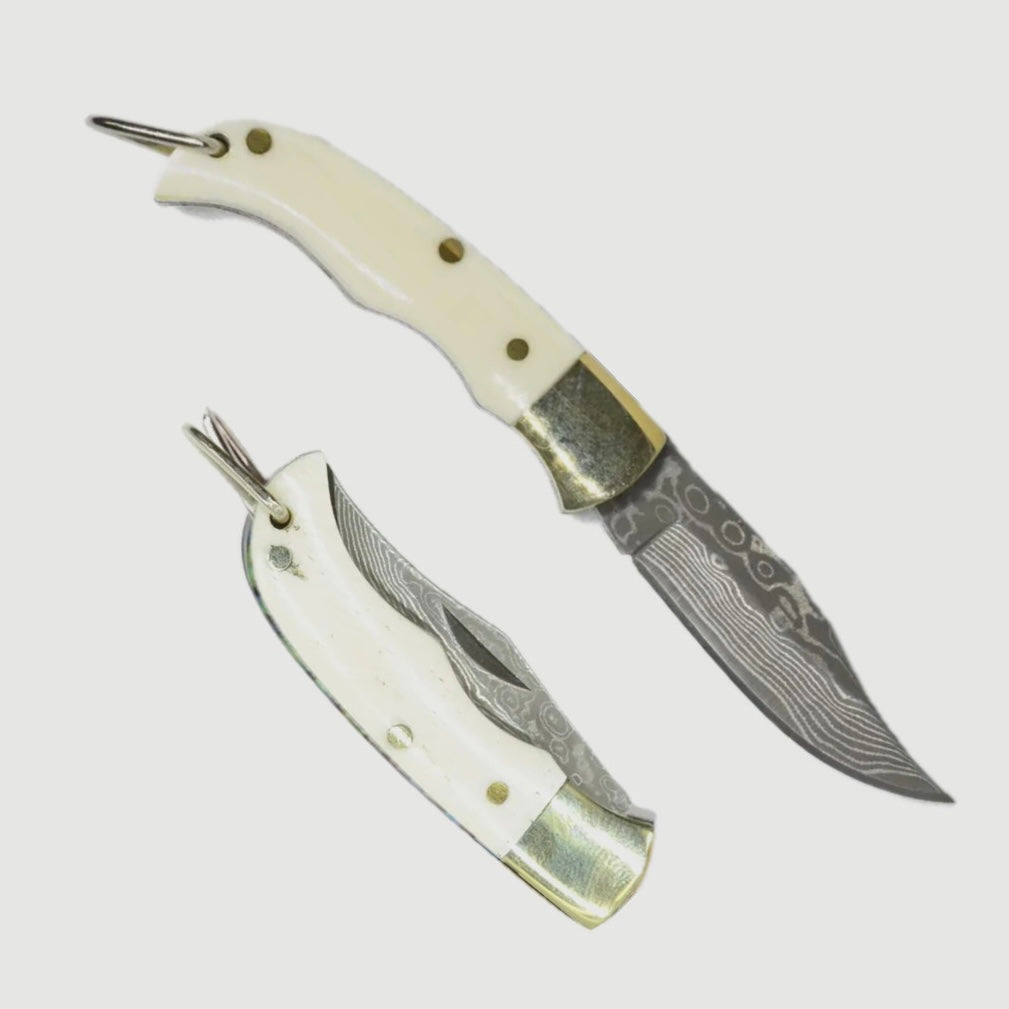 FOLDING KNIFE PEARL HANDLE WHITE OX BONE